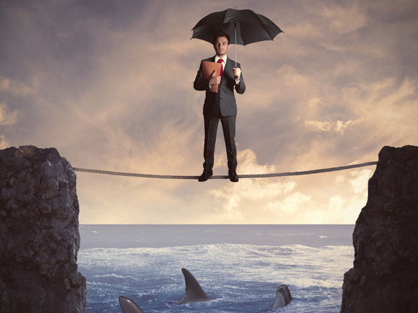 Даже «акулам бизнеса» иногда нужен спасительный зонтик – поддержка государства. Особенно, когда вокруг бурлит кризис. Фото: Photoxpress