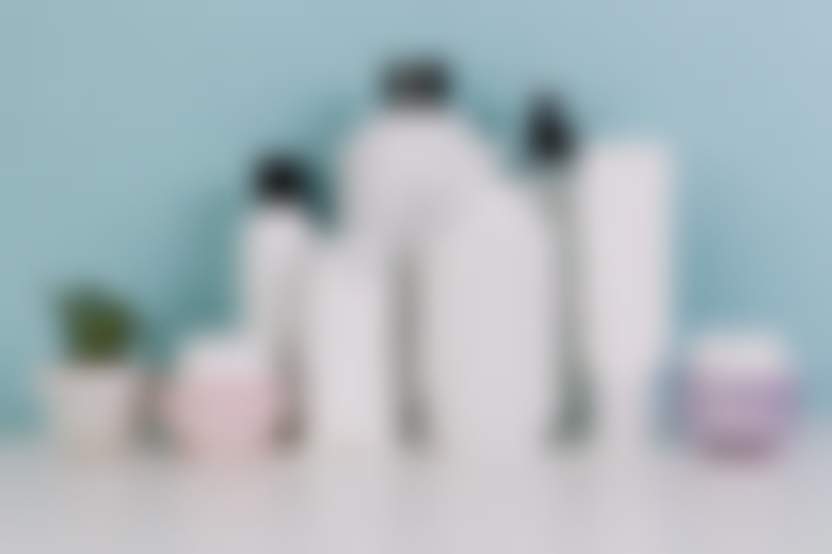 small-plant-near-various-cosmetics-bottles.jpg